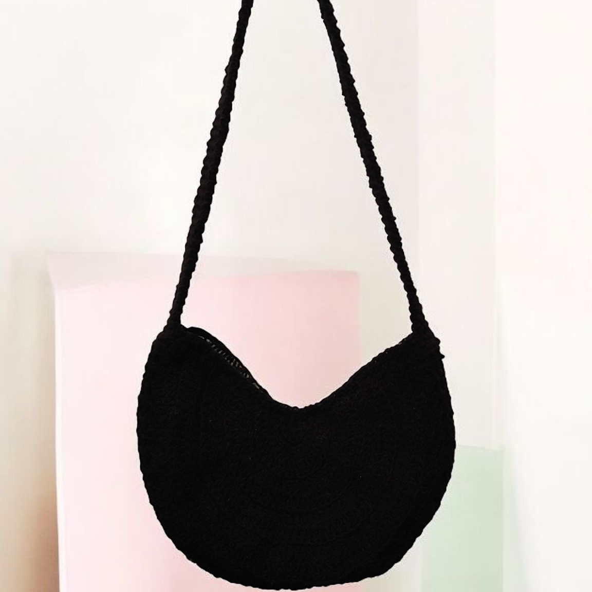 Black crochet shoulder bag.