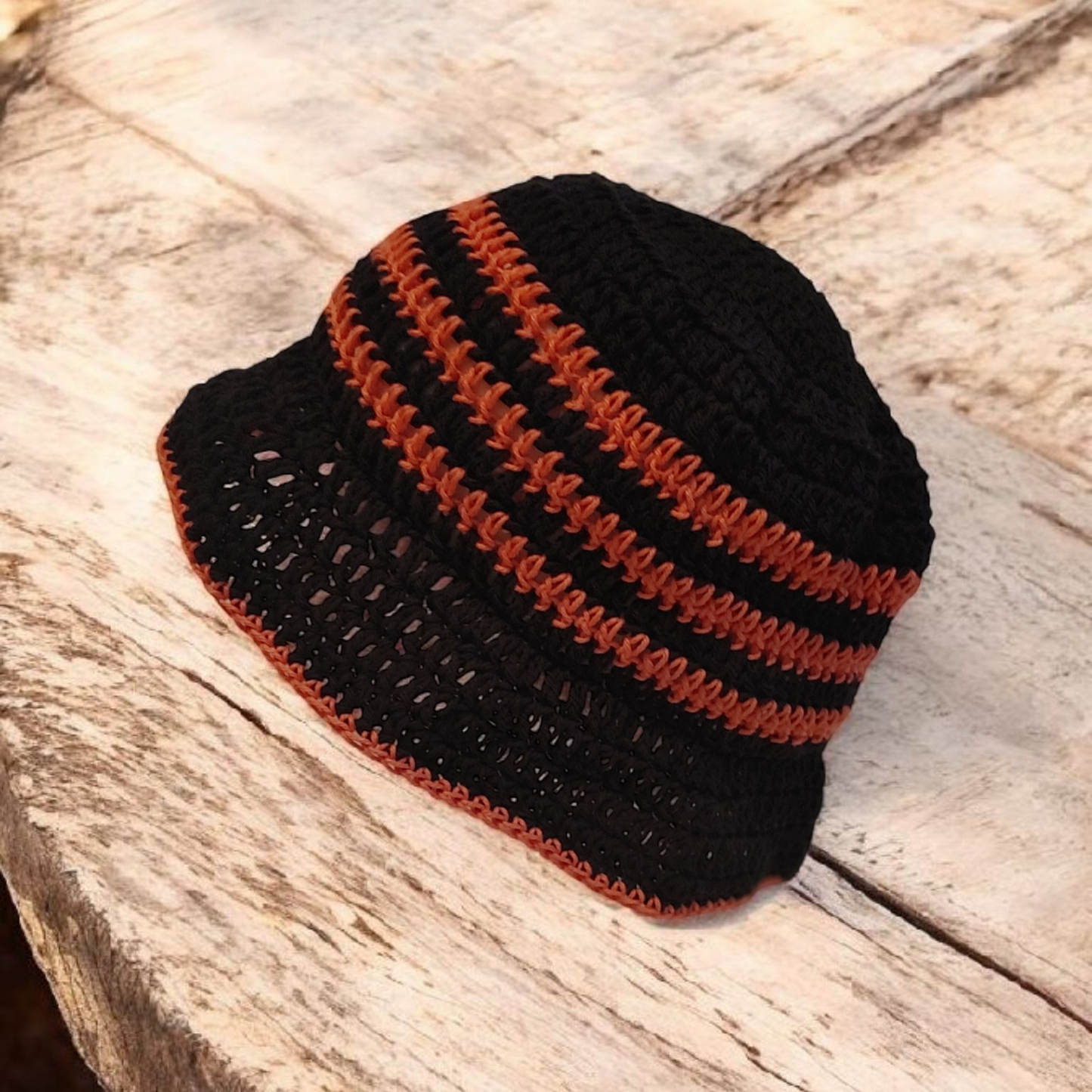 Black and coral striped crochet bucket hat.
