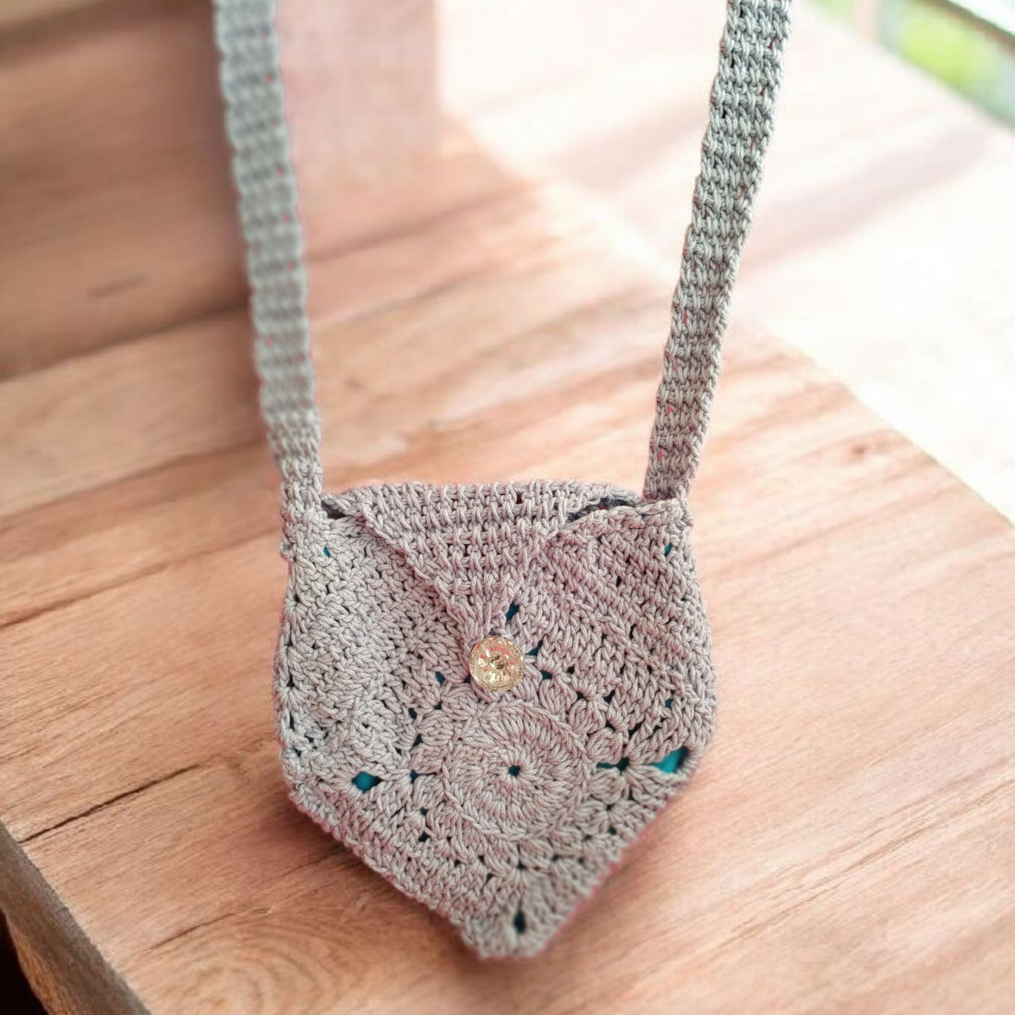 Crochet blue granny square bag.