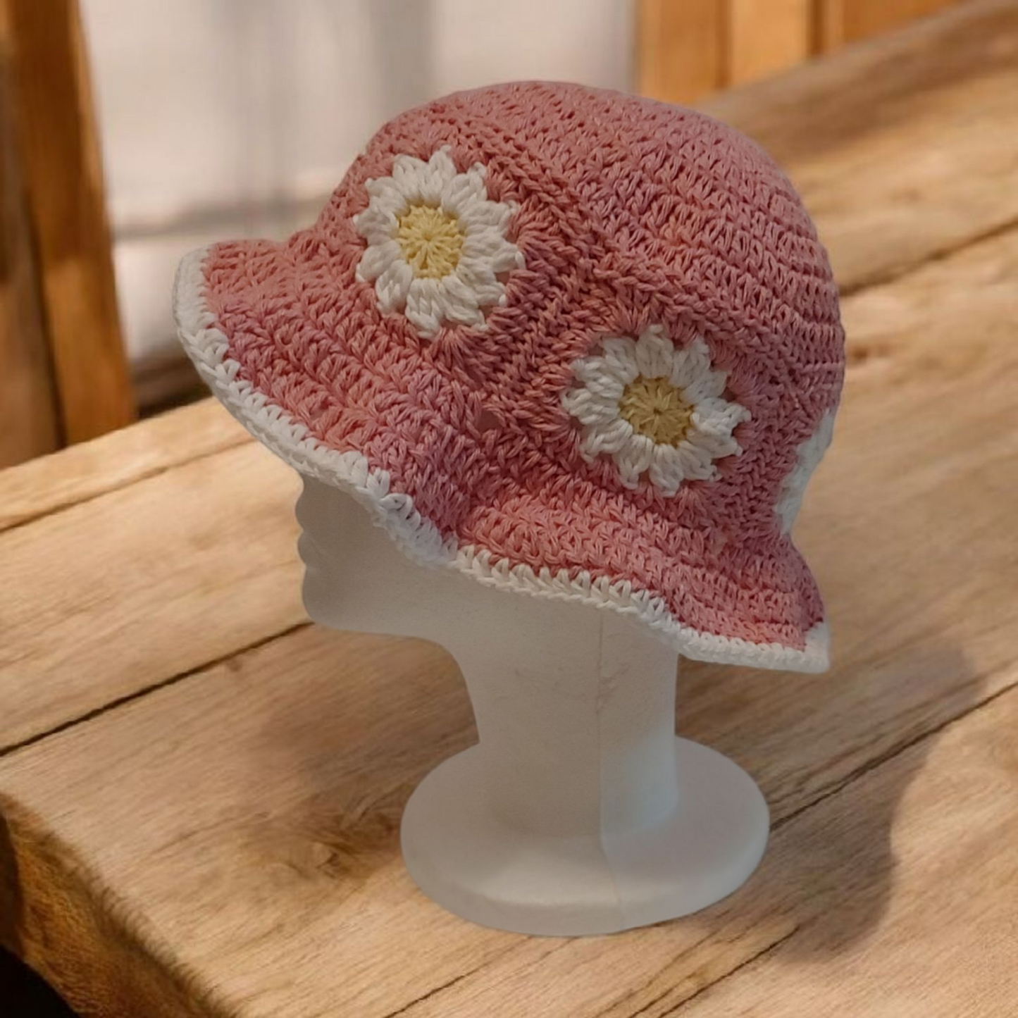 Crochet pink daisy bucket hat.