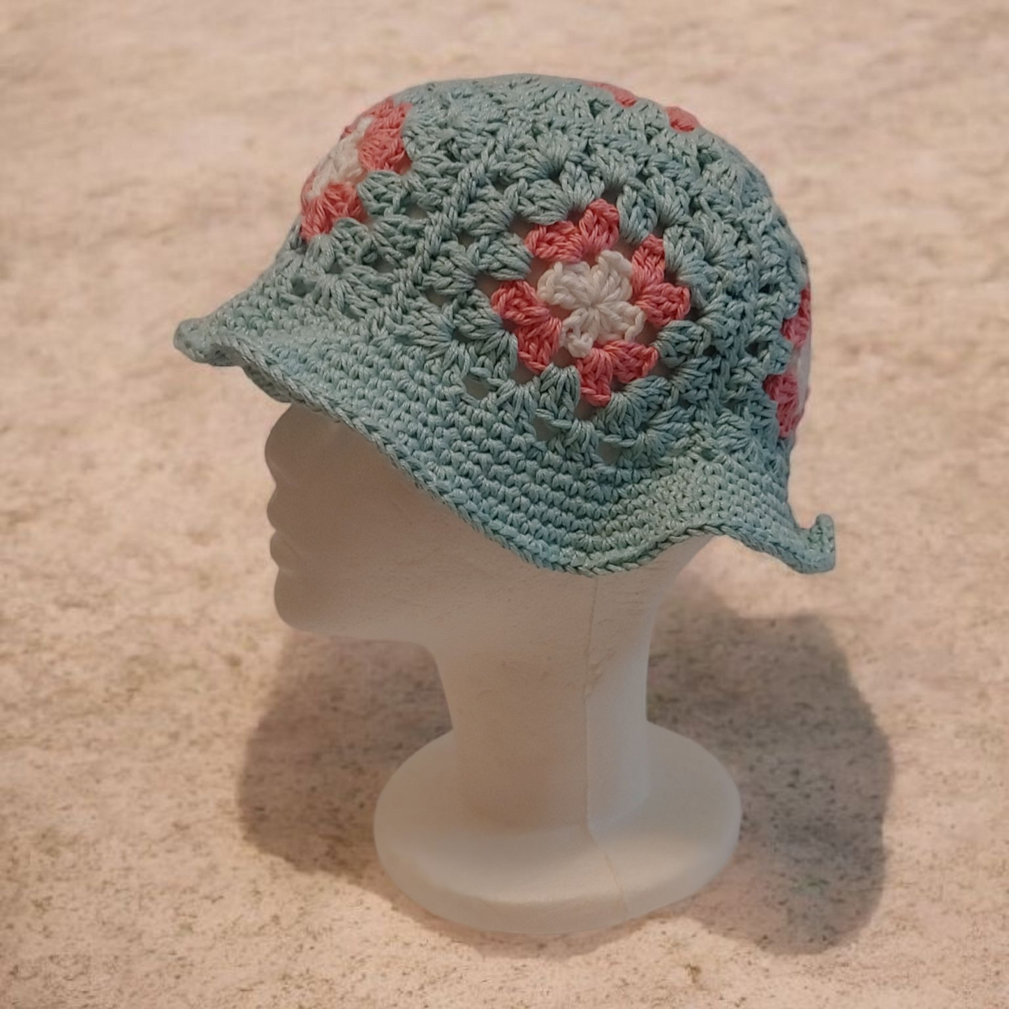 Blue and Pink handcrafted crochet granny square bucket.