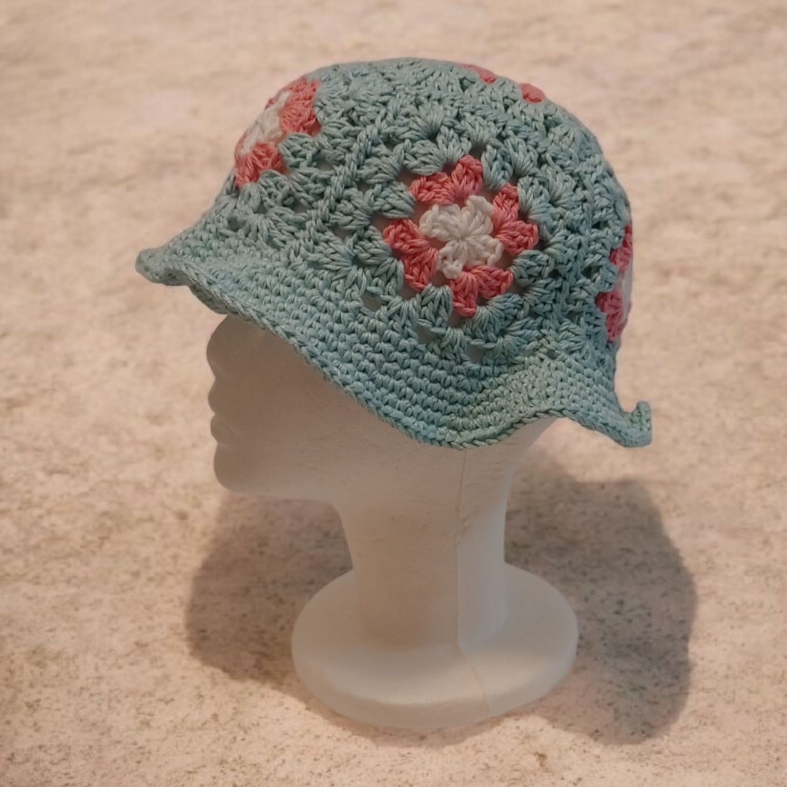 Blue and Pink handcrafted crochet granny square bucket.