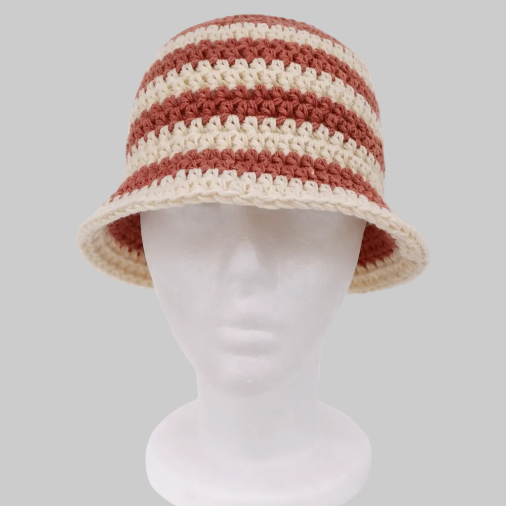 Handmade desert stripe crochet bucket hat in warm neutral tones, crafted from eco-friendly cotton yarn