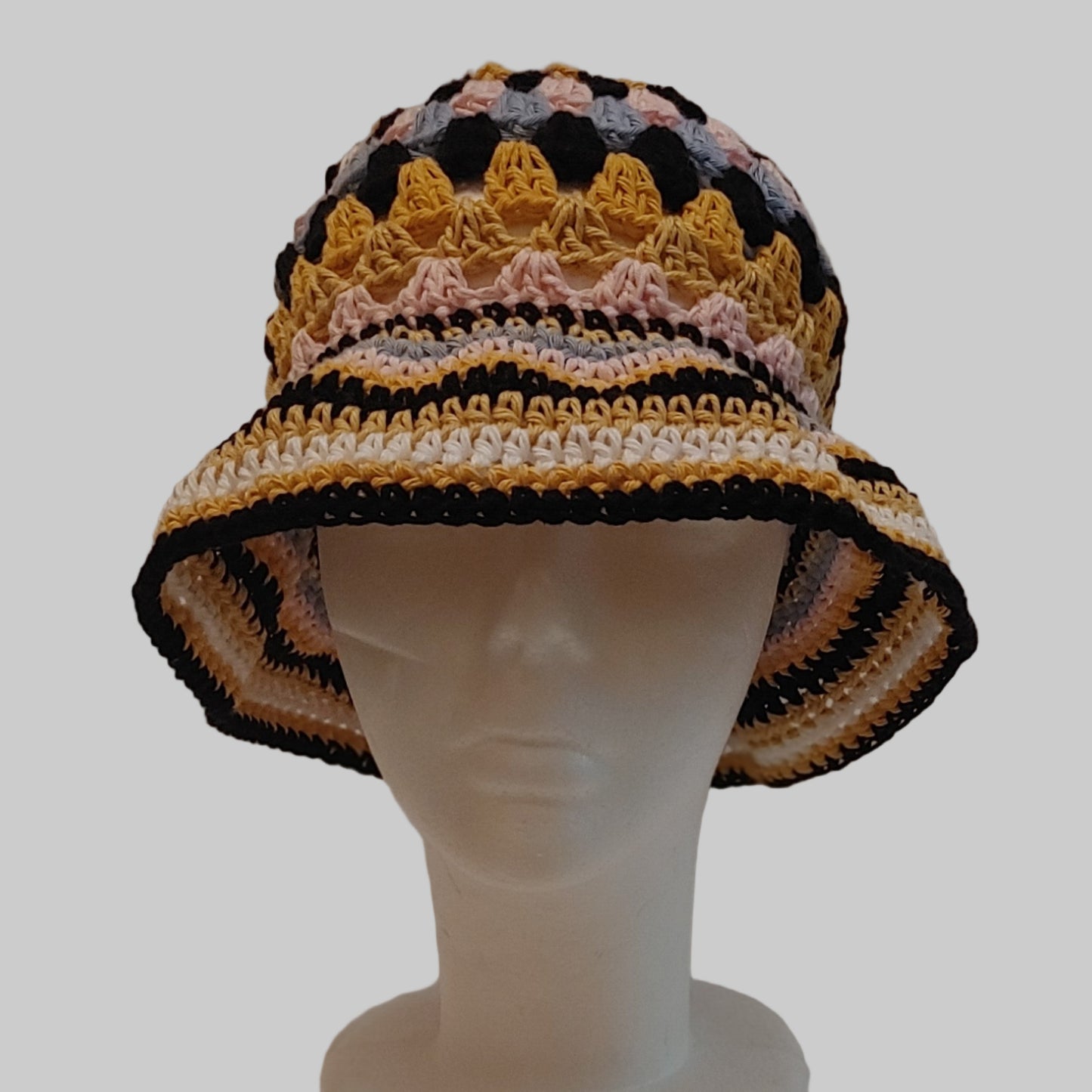 Multi colored crochet bucket hat.