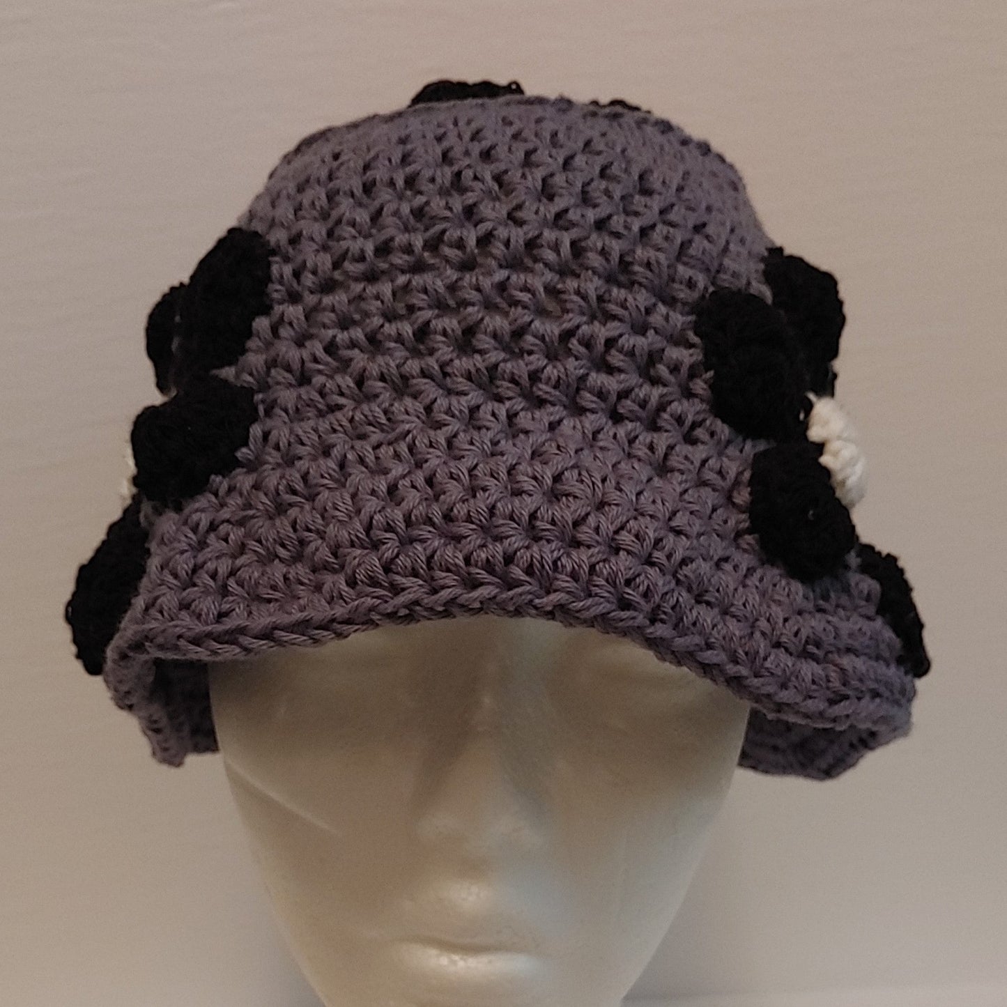 Grey and black floral crochet bucket hat.