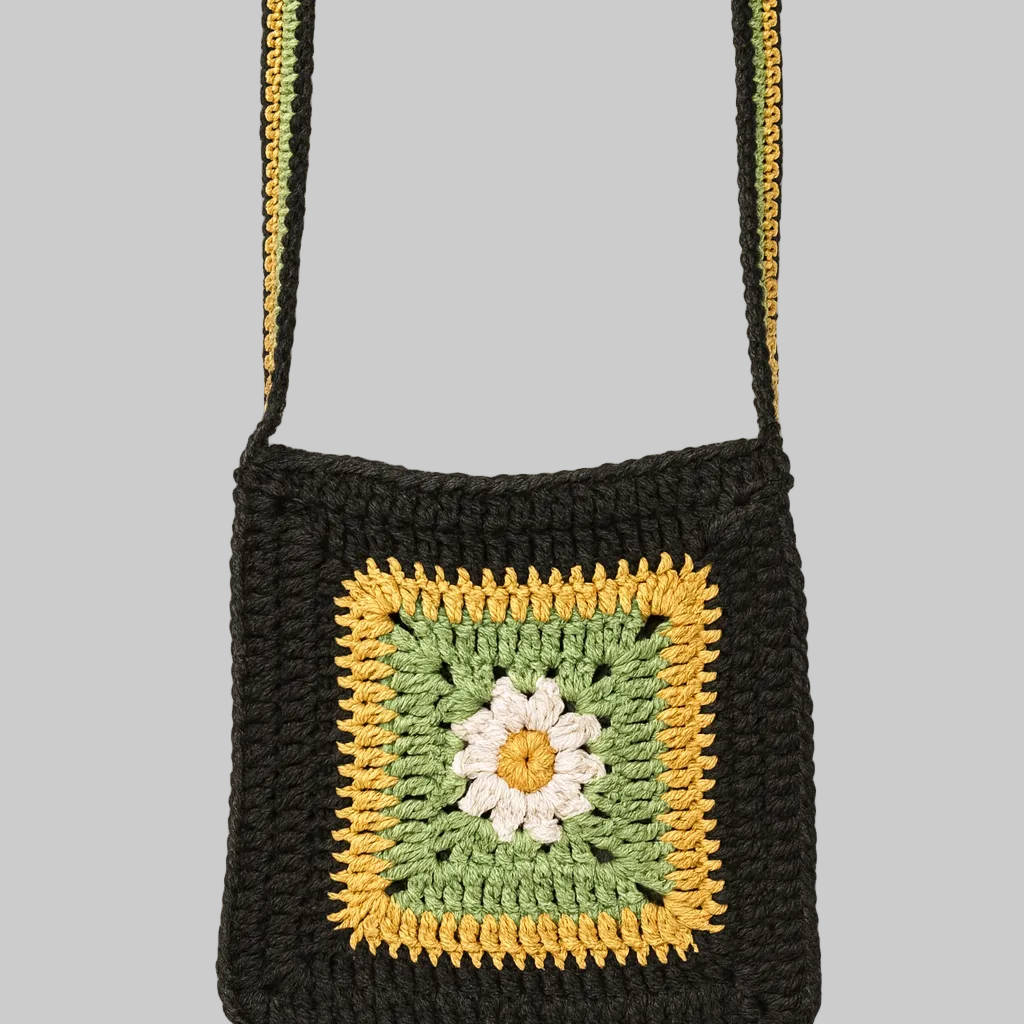 Handmade crochet crossbody bag with green and yellow floral granny square design, eco-friendly boho shoulder bag