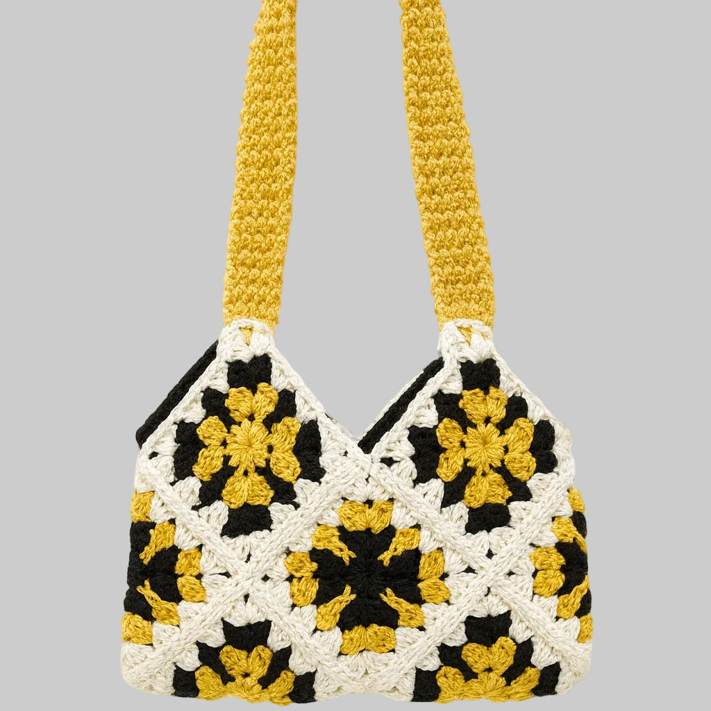 Handmade crochet granny square handbag in mustard yellow and cream with black accents, Golden Meadow Granny Handbag by Green Stitch