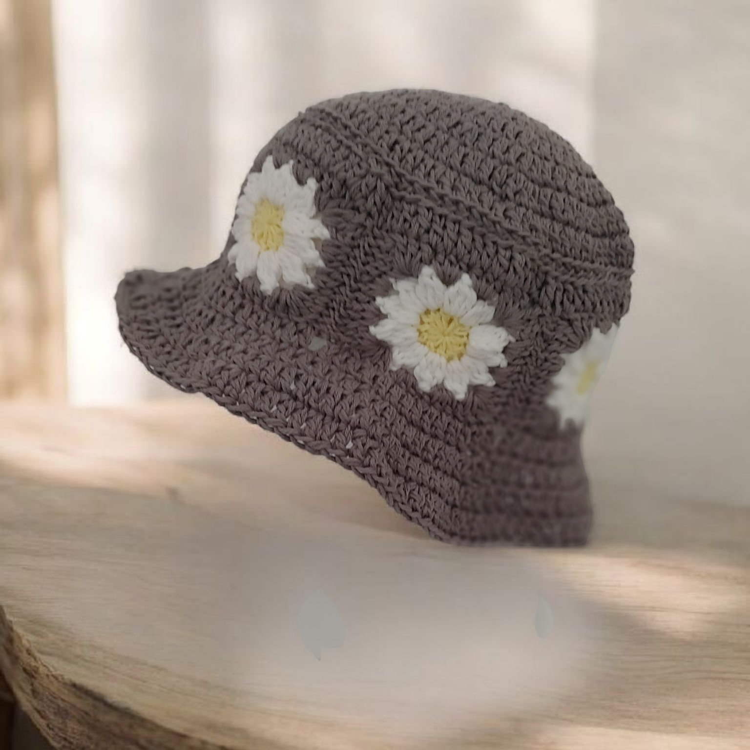 Grey daisy crochet bucket hat.