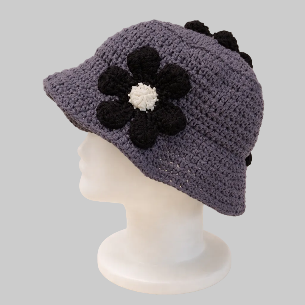Handmade midnight bloom crochet bucket hat featuring a dark floral motif, crafted from eco-friendly cotton yarn