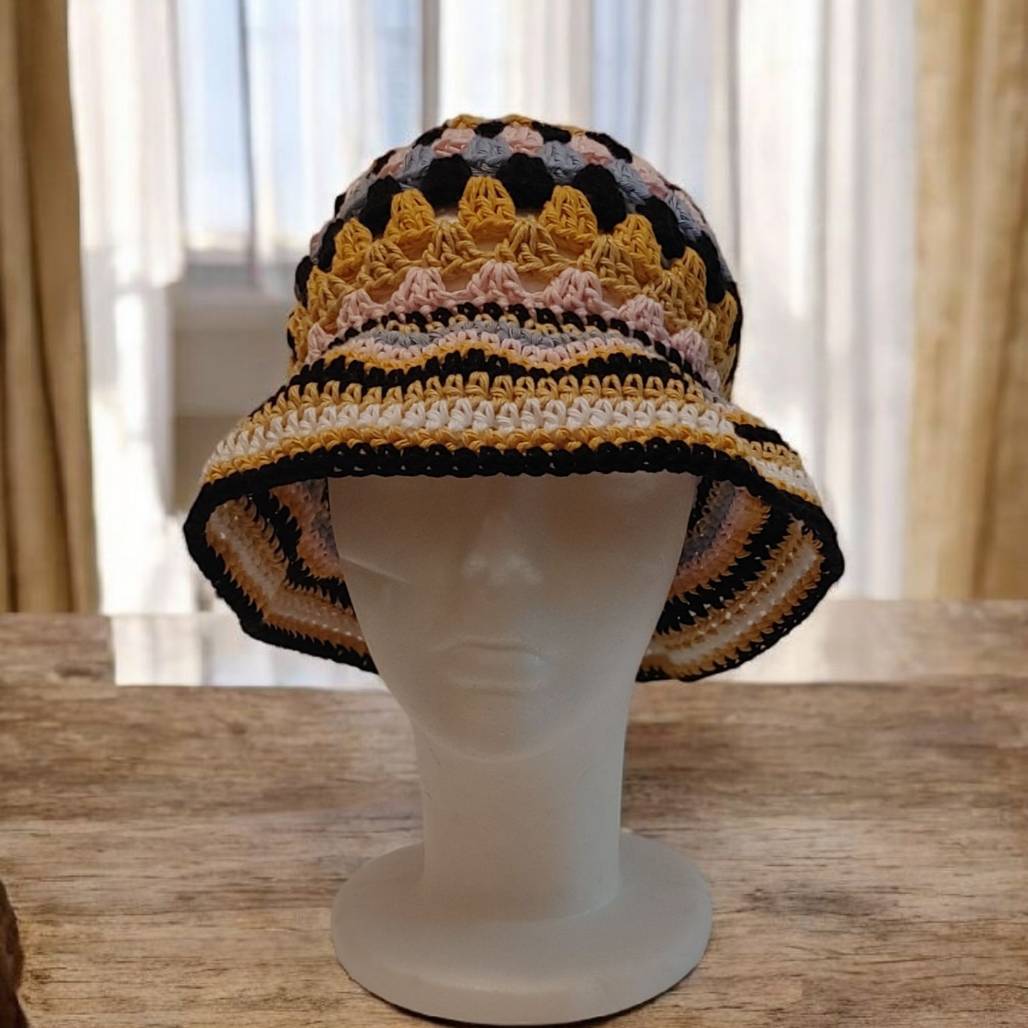 Multi colored crochet bucket hat.