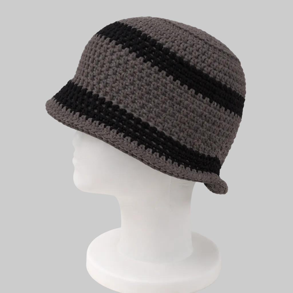 Handmade shadowline crochet bucket hat with charcoal and neutral striped pattern, crafted from eco-friendly cotton yarn