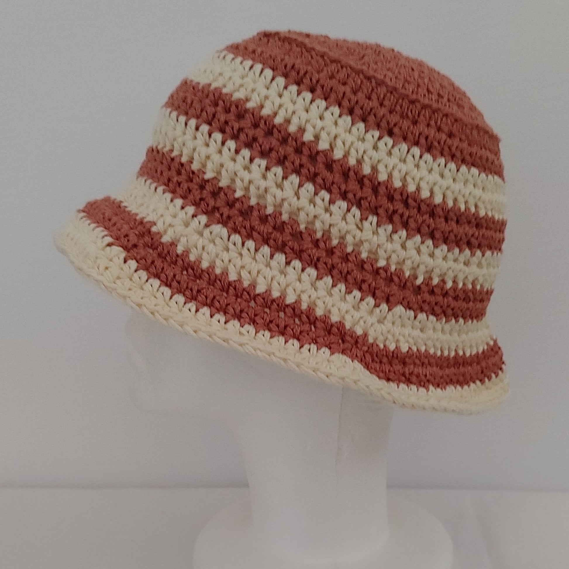 Striped bronze and cream striped crochet bucket hat.
