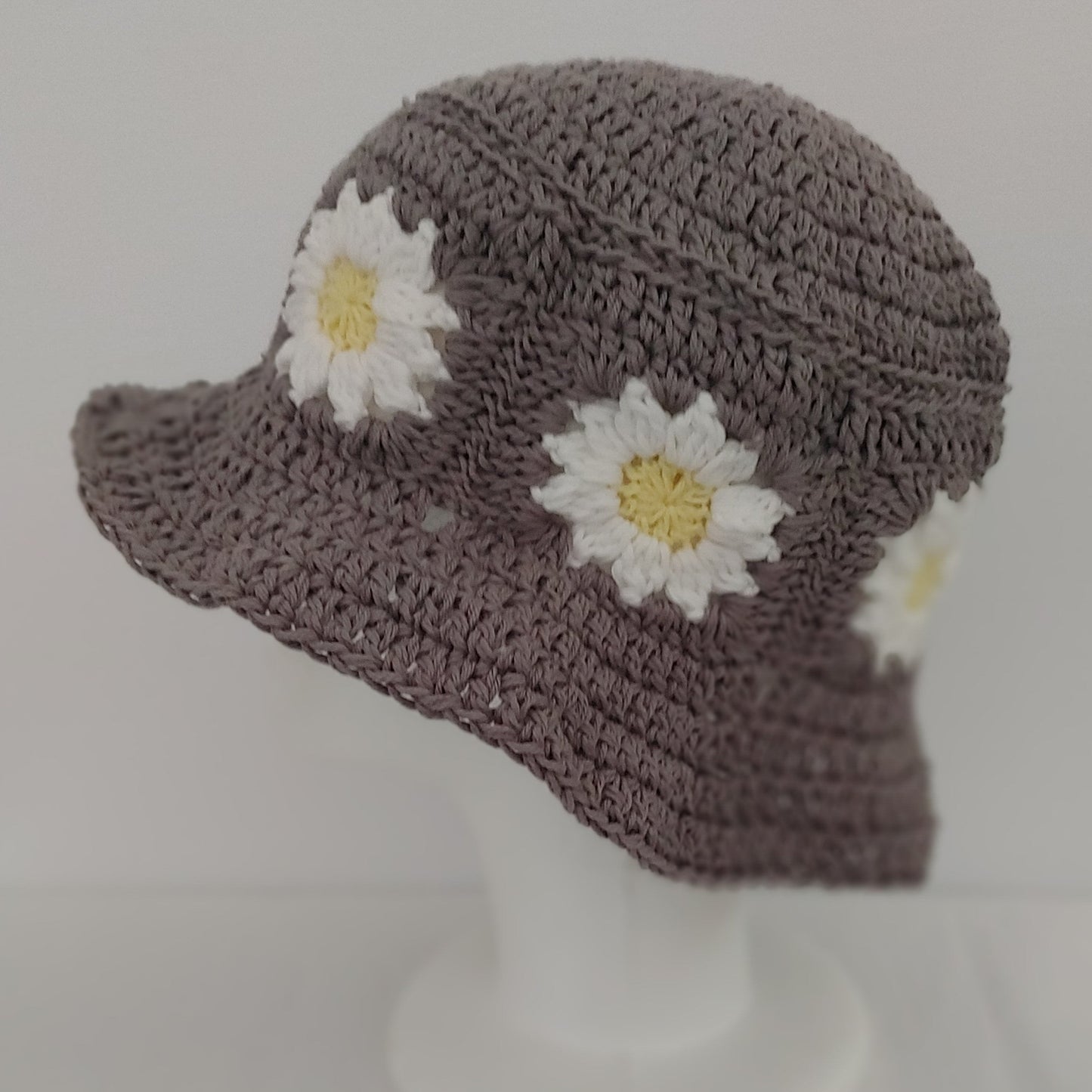 Grey daisy crochet bucket hat.