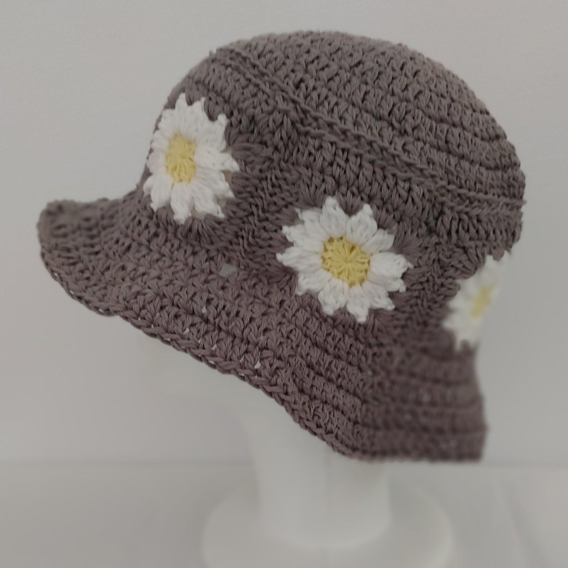 Grey daisy crochet bucket hat.