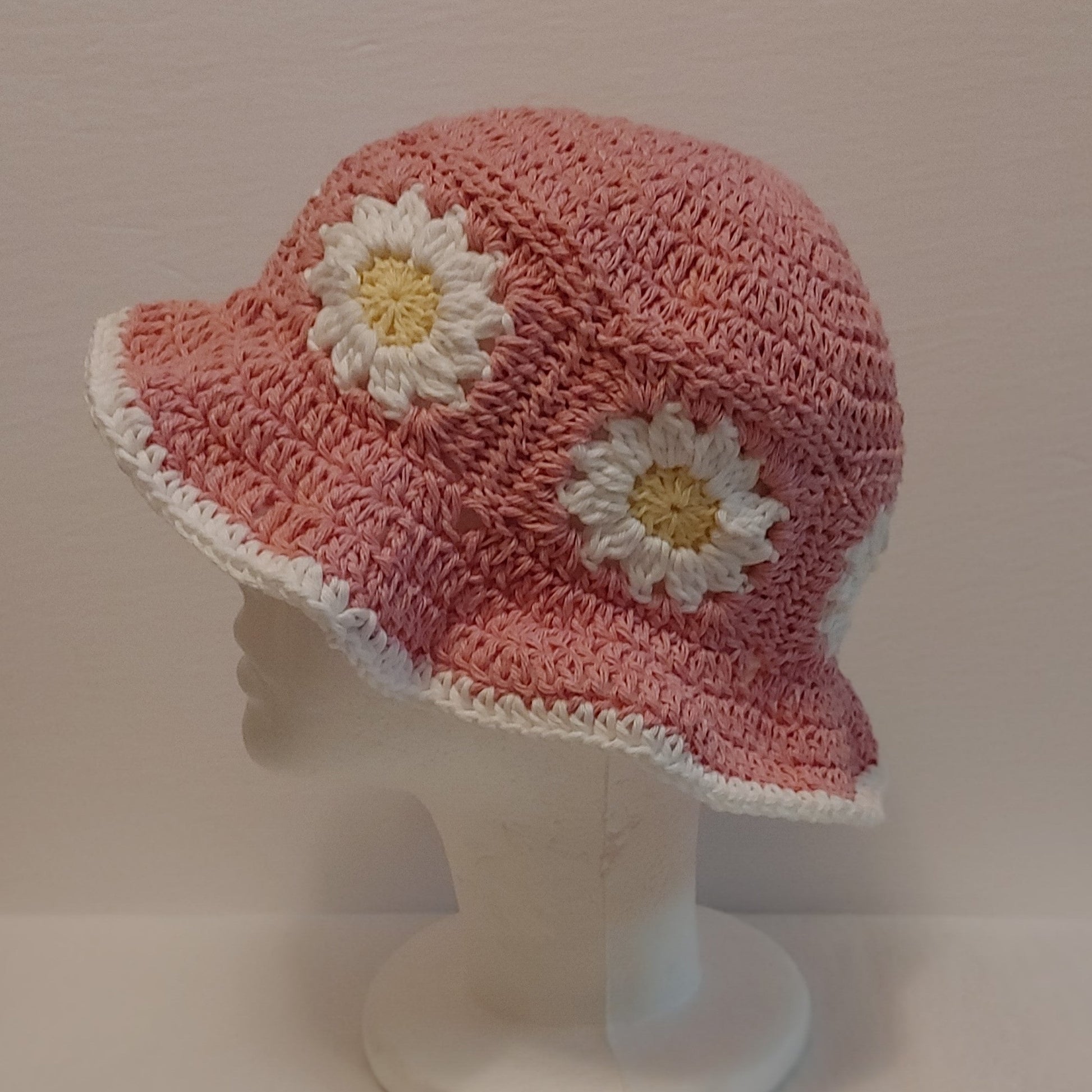 Pink daisy crochet bucket hat.